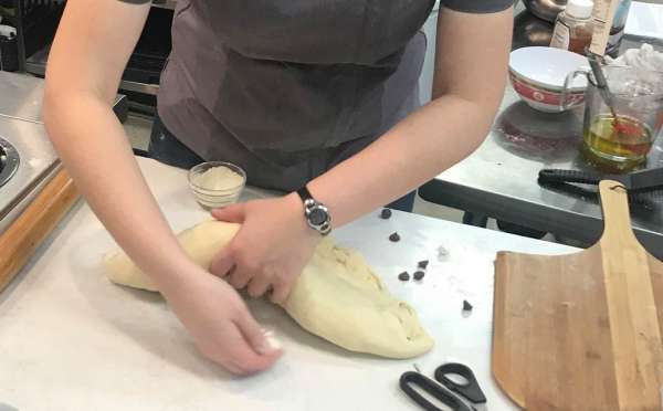 Chef Mary making calzone