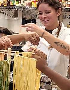 Kids Hands on Pasta